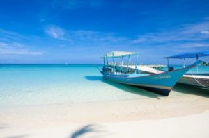 Capitan Brooks boat beached on Roatan's West Bay Beach